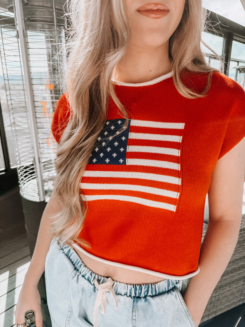 sleeveless "freedom" sweater