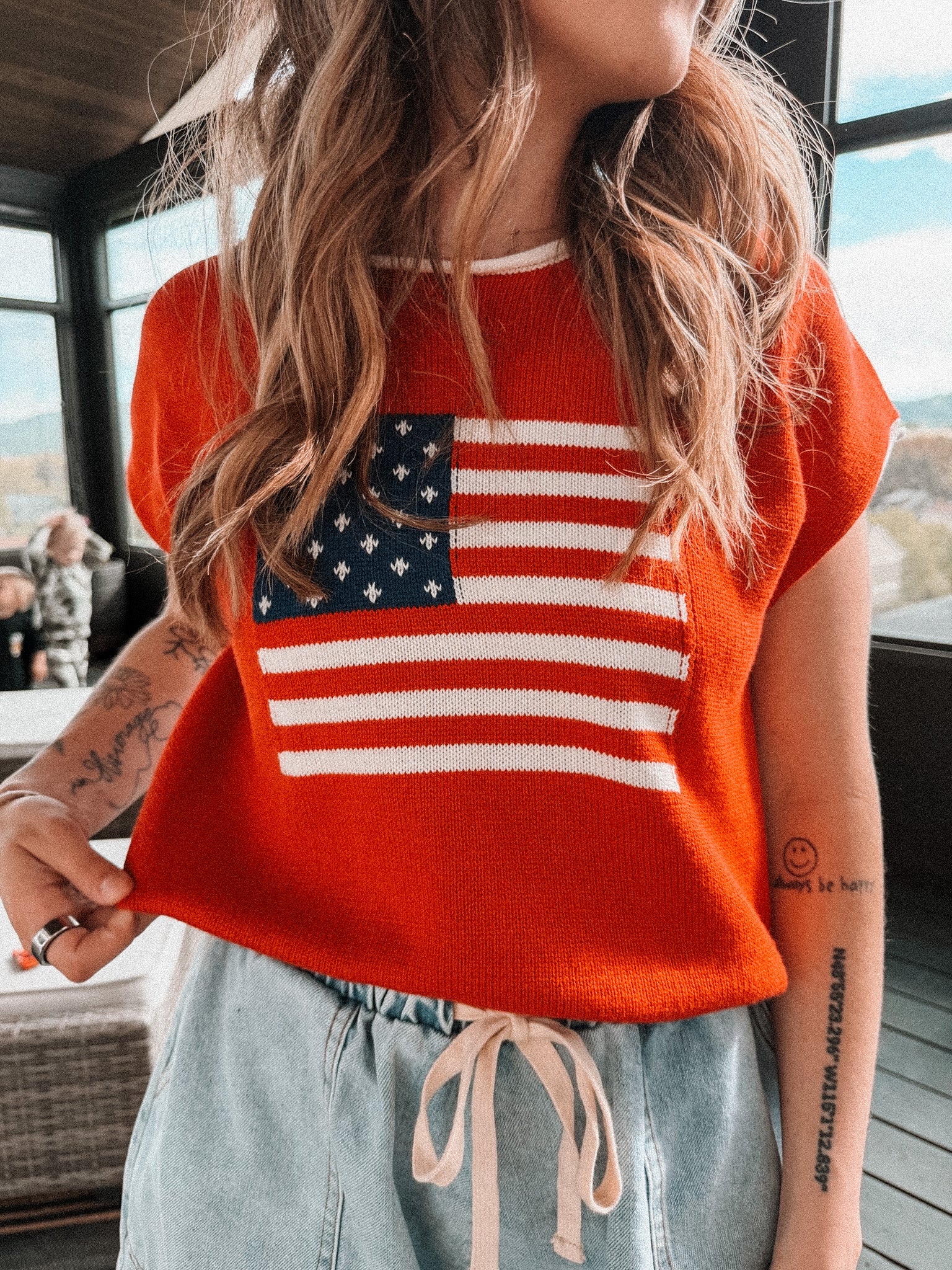 sleeveless "freedom" sweater